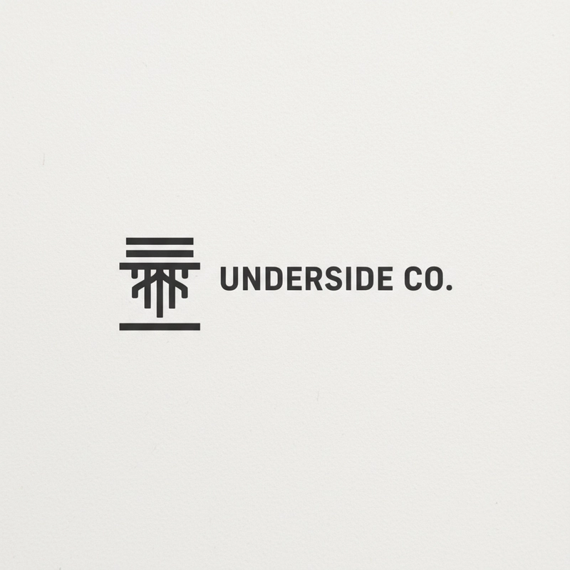AI logo design: **“Create a minimalist, modern streetwear logo for a brand called Underside Co.. The brand identity... - Generated with Gemini nano banana